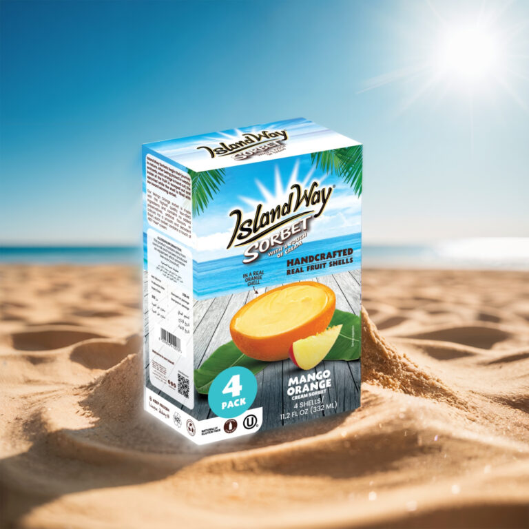 Pack de 4 sorbets Island Way Mangue Orange servis dans des coques d’orange, mis en avant sur le sable